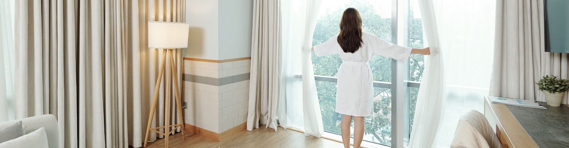 Man and women checking into a hotel